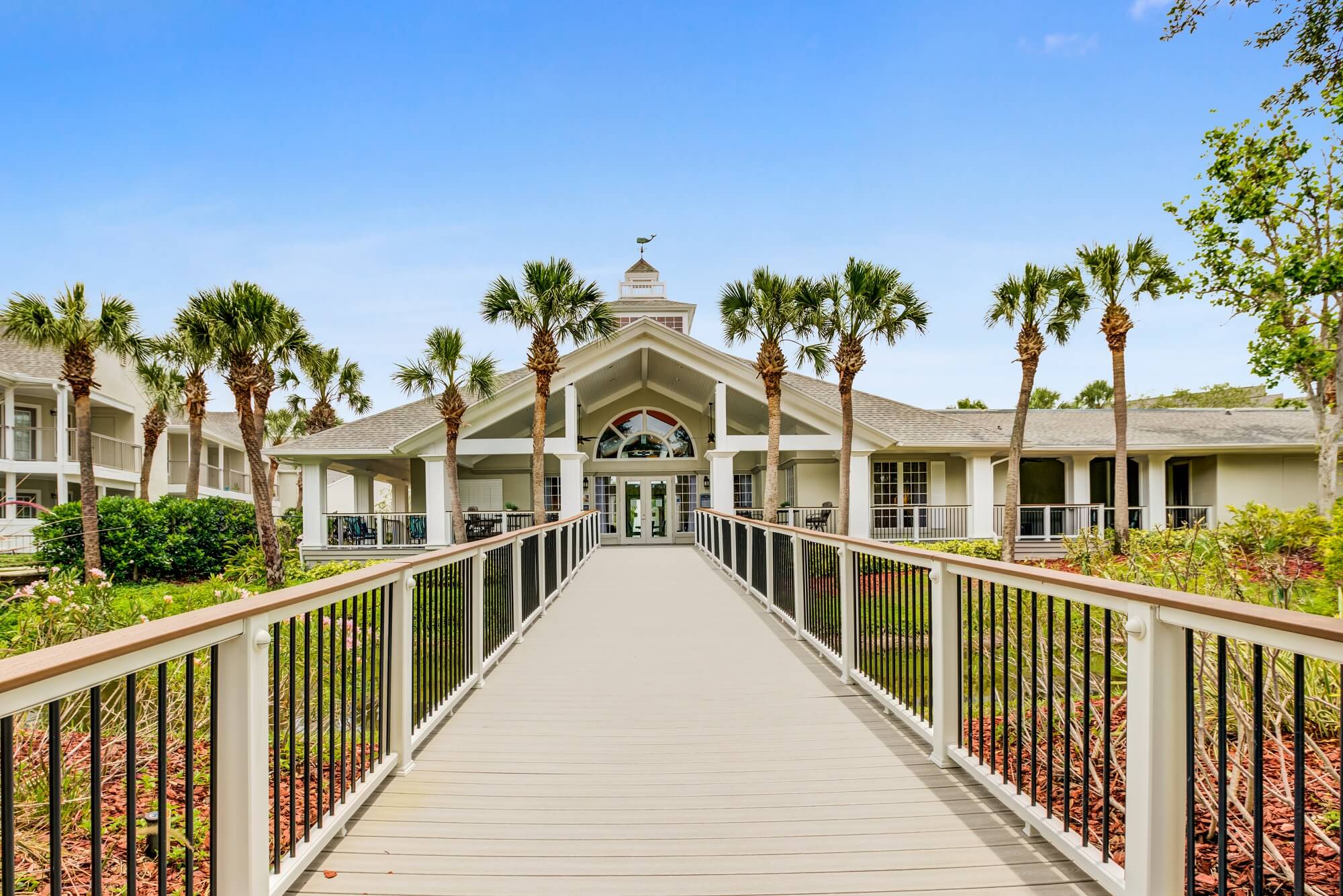 long wooden walkway to clubhouse.